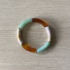 bracelet jonc élastique tube vert clair marron beige